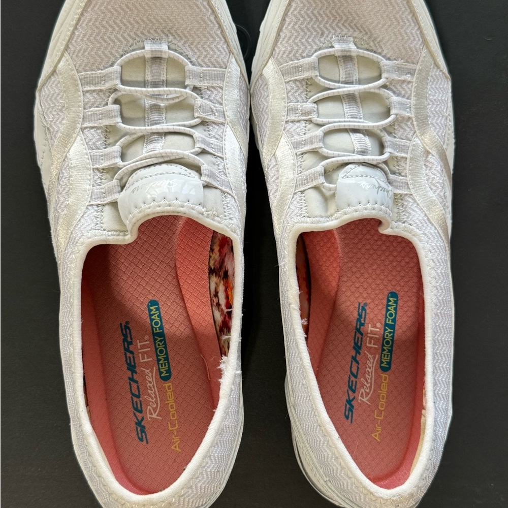 Skechers Women’s White Slip-On Athletic Sneakers with Pink Insole